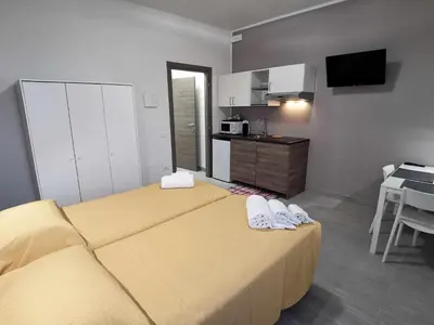 Letto o letti in una camera di Casa Belfiore Vicenza Via Medici 17