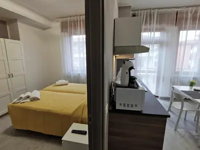 Letto o letti in una camera di Casa Belfiore Vicenza Via Medici 17