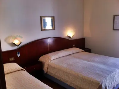 Letto o letti in una camera di Hotel Arborea