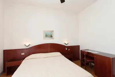 Letto o letti in una camera di Hotel Arborea