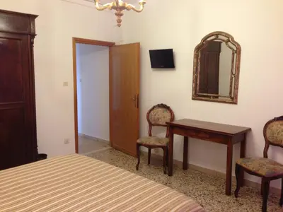 Letto o letti in una camera di Casa del Pozzo