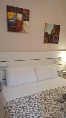 Letto o letti in una camera di Casa del Pozzo