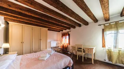 Letto o letti in una camera di Residenza Al Mercato Grand Canal