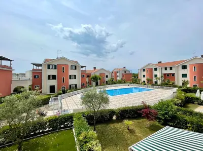 Piscina di Residence Ca D'Oro con piscina Cavallino - Carraro Immobilare - Family Apartments o nelle vicinanze
