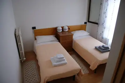 Letto o letti in una camera di Appartamento Casa Paola