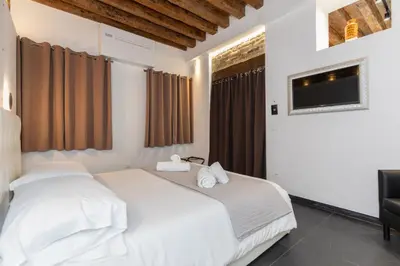 Letto o letti in una camera di Giorgiapartaments Black exclusive