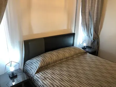 Letto o letti in una camera di Marin Traghetto - Locazione Turistica