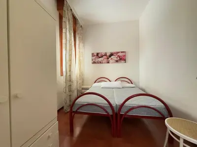 Letto o letti in una camera di CONDOMINIO UNION -Walterigato Apartments- SOLO PER FAMIGLIE-