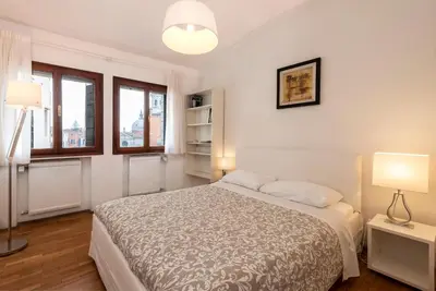 Letto o letti in una camera di Le case di Rachele - Ca' Lorenzo e Ca' Raquel