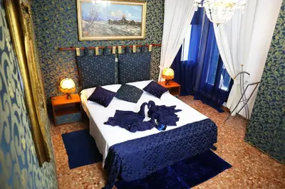 Letto o letti in una camera di VENICE RAINBOW APARTMENT (RIALTO)