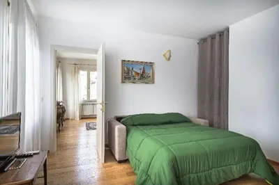 Letto o letti in una camera di Casa Bastianello favolosa vista sul Canale Vena