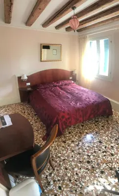 Letto o letti in una camera di B&B a le Boteghe