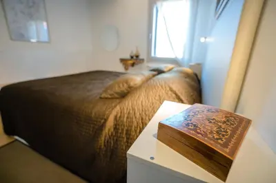 Letto o letti in una camera di Specchieri