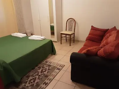 Area soggiorno di Locazione Menini - Camere zona stazione