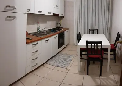 Cucina o angolo cottura di Locazione Menini - Camere zona stazione