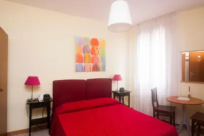 Letto o letti in una camera di Hotel dalla Mora