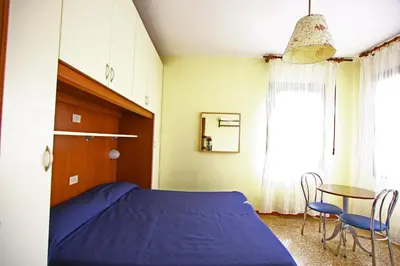 Letto o letti in una camera di Hotel dalla Mora