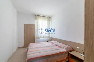 Letto o letti in una camera di Condominio Baraziol