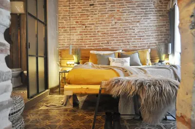 Letto o letti in una camera di Maison du Flâneur