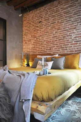 Letto o letti in una camera di Maison du Flâneur