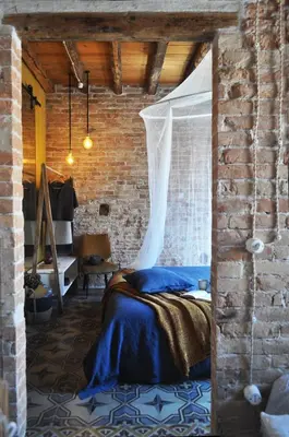 Letto o letti in una camera di Maison du Flâneur