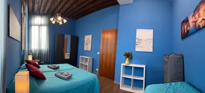 Letto o letti in una camera di TINTORETTO VISTA REAL VENICE