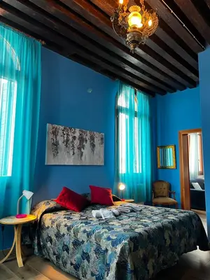 Letto o letti in una camera di TINTORETTO VISTA REAL VENICE