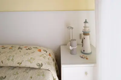 Letto o letti in una camera di Le Petit Hotel