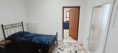 Letto o letti in una camera di My Rialto Palace