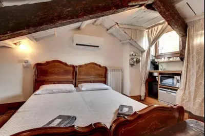Letto o letti in una camera di Venice traditional home with terrace