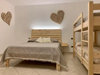 Letto o letti in una camera di Agriturismo Nonno Mario