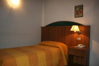 Letto o letti in una camera di Locanda Stella D'oro