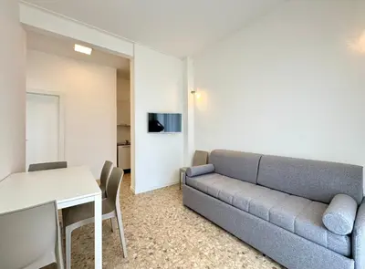 TV o dispositivi per l'intrattenimento presso Villa Fronte Mare - Carraro Immobiliare - Family Apartments