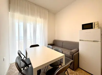 Area soggiorno di Villa Fronte Mare - Carraro Immobiliare - Family Apartments