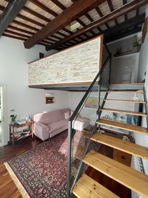 Area soggiorno di Elena Casa Turistica