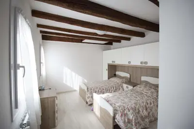 Letto o letti in una camera di Dimora Marchiada - Isola di Pellestrina Ve