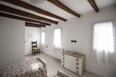 Letto o letti in una camera di Dimora Marchiada - Isola di Pellestrina Ve