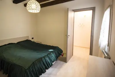 Letto o letti in una camera di Dimora Marchiada - Isola di Pellestrina Ve