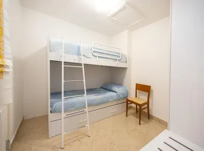 Letto o letti in una camera di Dimora Laguna - Isola di Pellestrina Ve