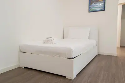 Letto o letti in una camera di Family Place
