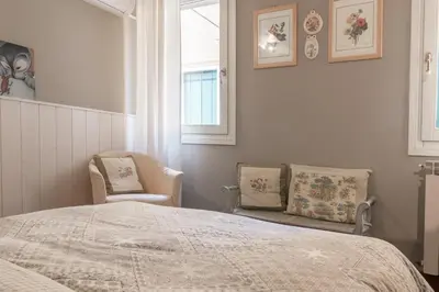Letto o letti in una camera di Ca Falier Piccolo - little sweet studio in 10-12 minutes from bus&train station