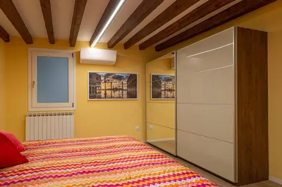 Letto o letti in una camera di NINA VENICE APARTMENT