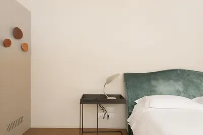 Letto o letti in una camera di Infinite House Ca' Vendramin
