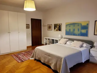 Letto o letti in una camera di Appartamento al Bò