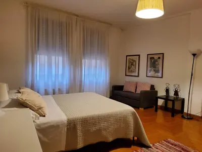 Letto o letti in una camera di Appartamento al Bò