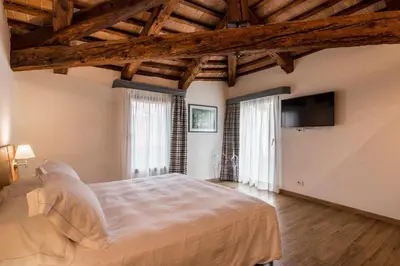 Letto o letti in una camera di Hotel Ristorante Magia del Brenta