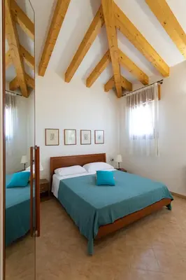 Letto o letti in una camera di Dimora Marina - Isola di Pellestrina Ve
