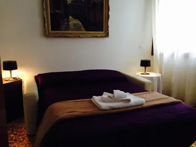 Letto o letti in una camera di Corte Coppo Superior Apartment