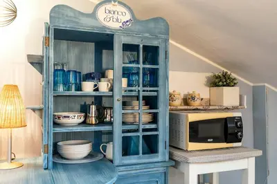 Cucina o angolo cottura di enJoy Home - Monolocale S Sofia sui tetti di Padova