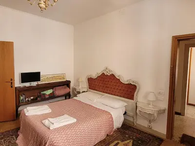 Letto o letti in una camera di Suite Doge Marcello